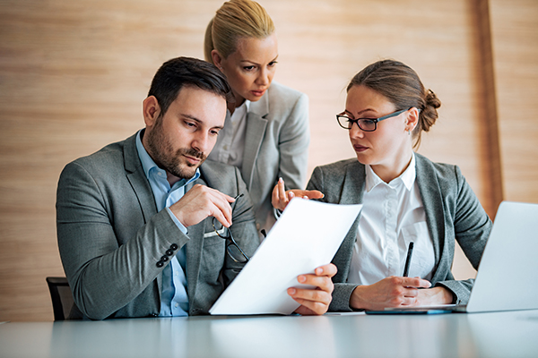 Three HR Professionals working together