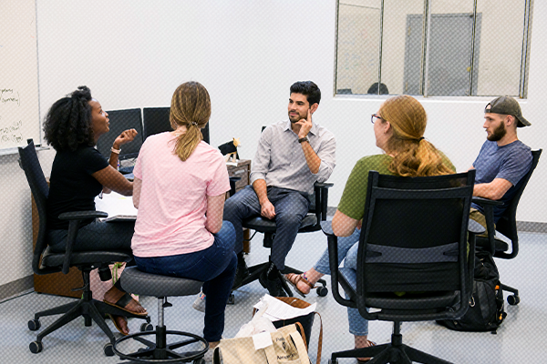 Team of students having a discussion