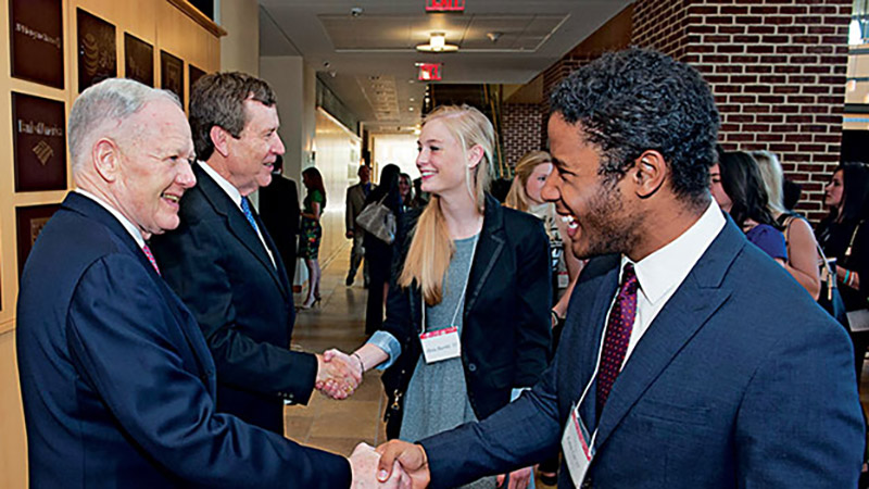 people shaking hands