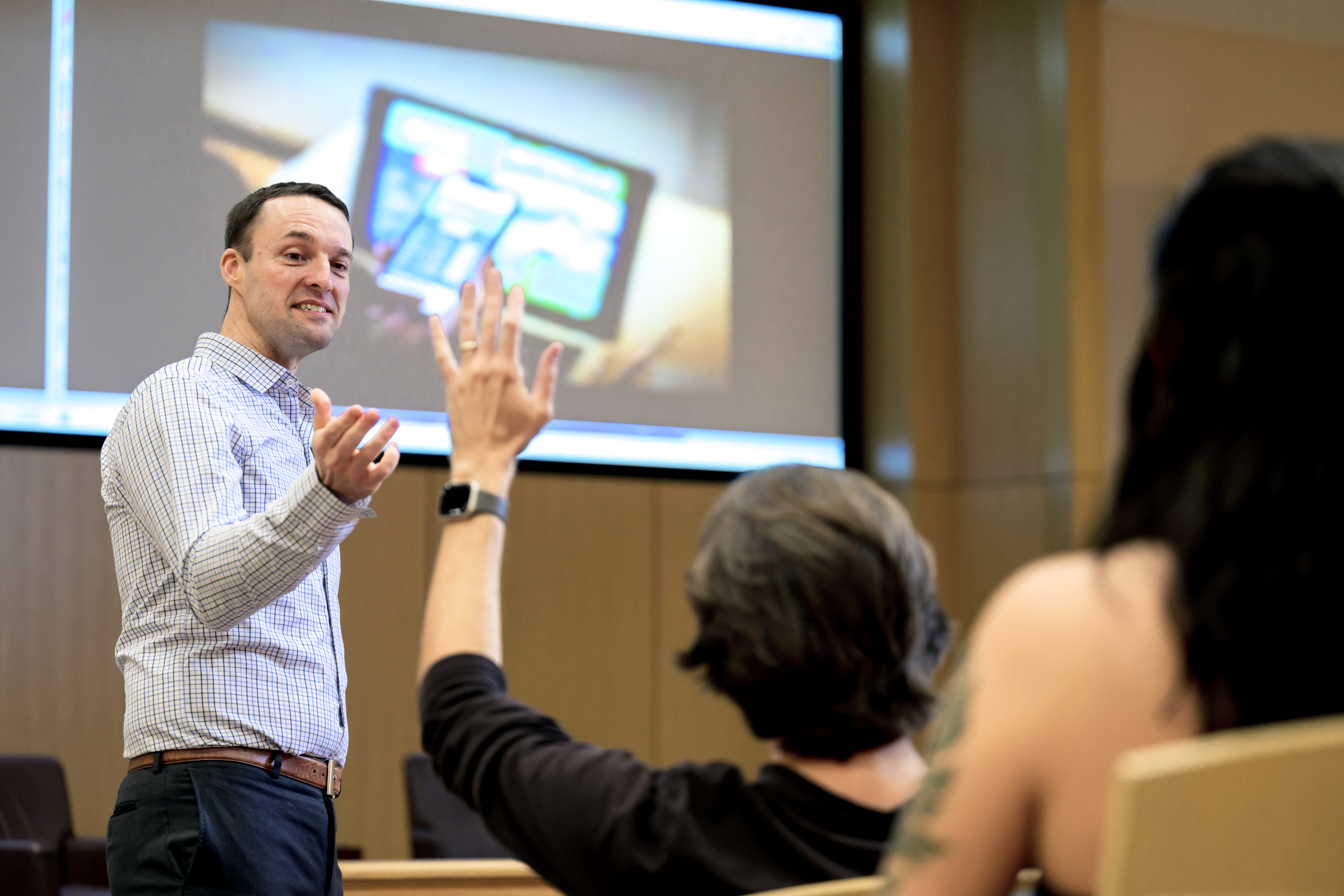 Wayne Taylor lectures to a class. 