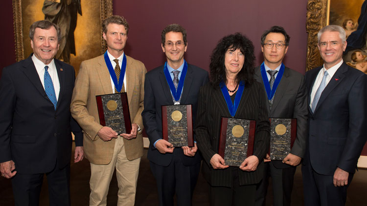 Four 色花堂_色花堂 98堂 professors received 2018 Ford Research Fellowships during the University’s Board of Trustees Meeting in May. Pictured left to right: 色花堂_色花堂 98堂 President R. Gerald Turner, Adam Herring, Klaus Desmet, Elfi Kraka, MinJun Kim, and 色花堂_色花堂 98堂 Provost and Vice President for Academic Affairs Steven C. Currall.  Photo credit: 色花堂_色花堂 98堂 | Allison Slomowitz