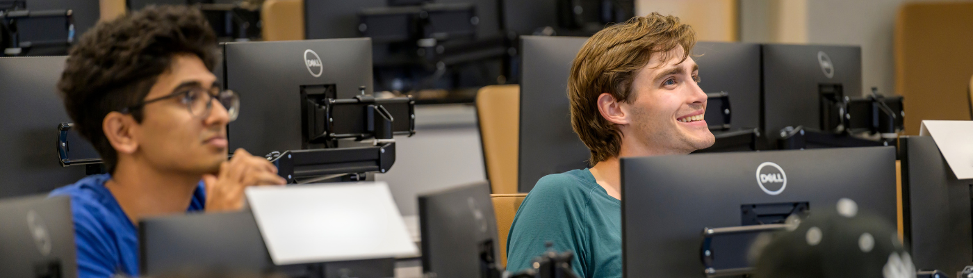 two students in class in the Kitt Center