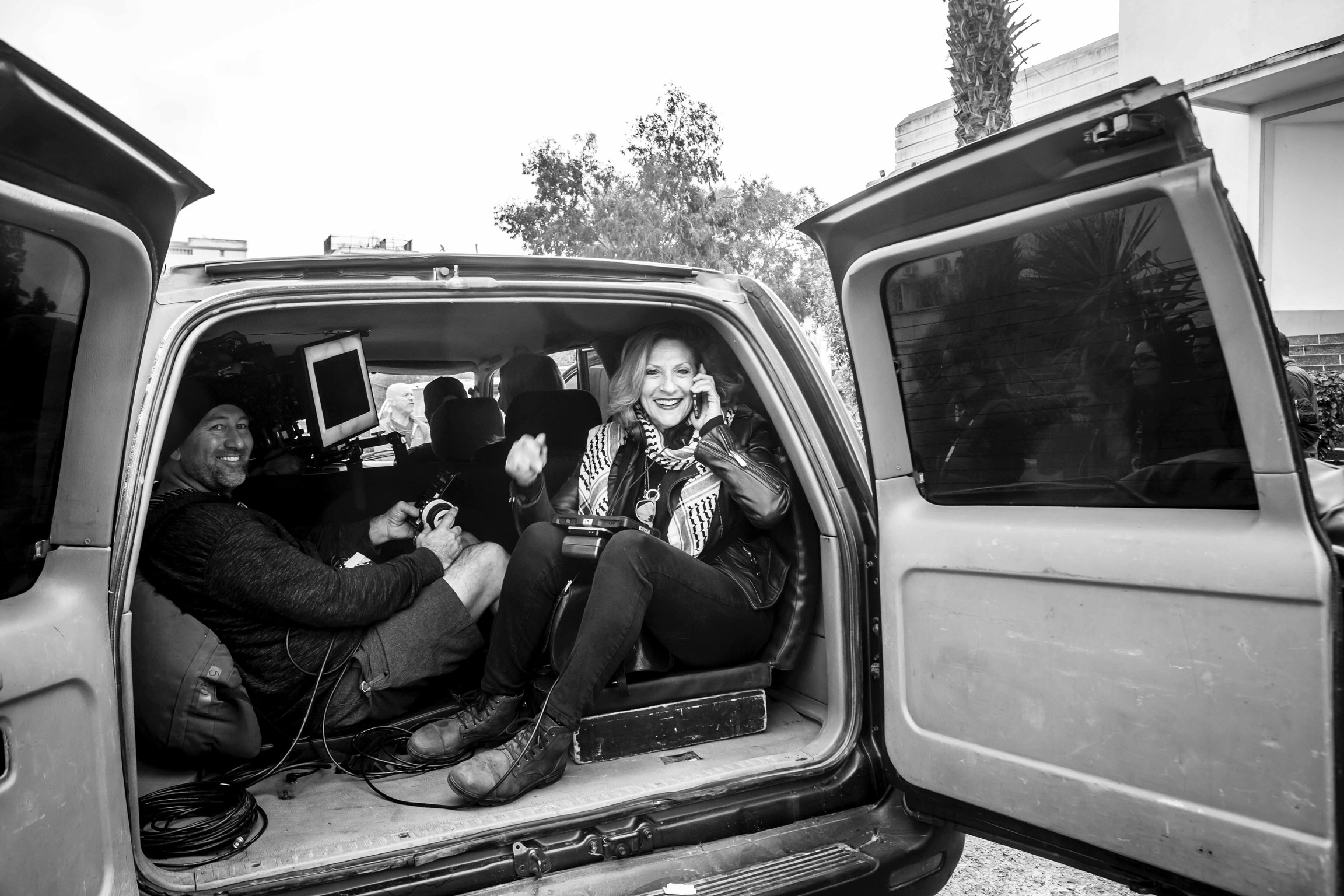 Lesli Linka Glatter directing a film shoot from the back of a production van.