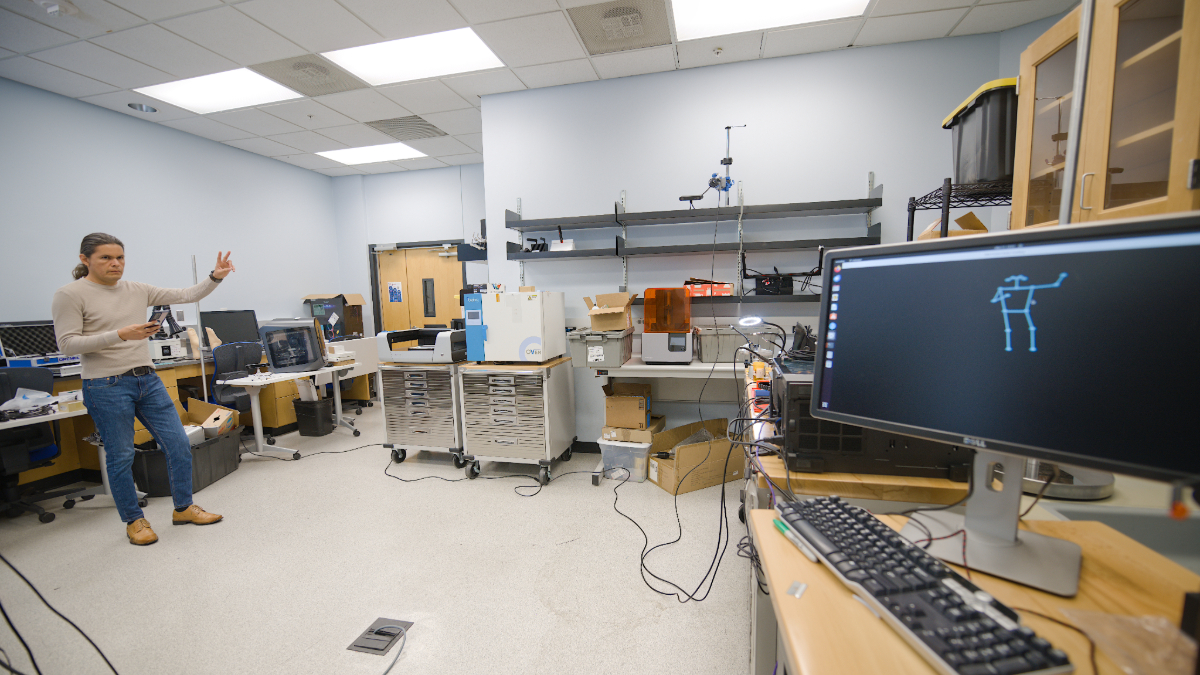 Guillermo Vasquez tests pose detection model in the IoT Lab.