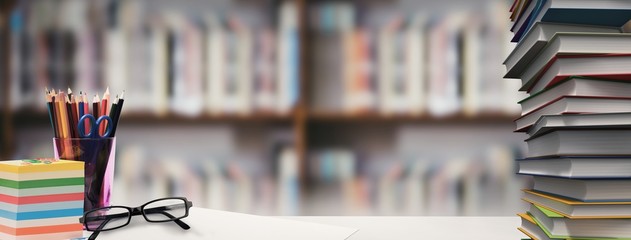 desk with books and pencils
