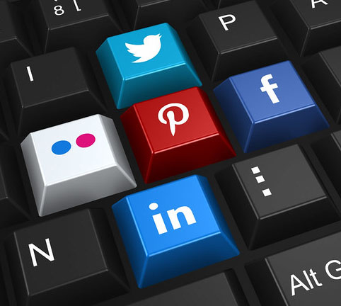 A keyboard with social media icons instead of letters (facebook, pinterest, flickr, linked-in)
