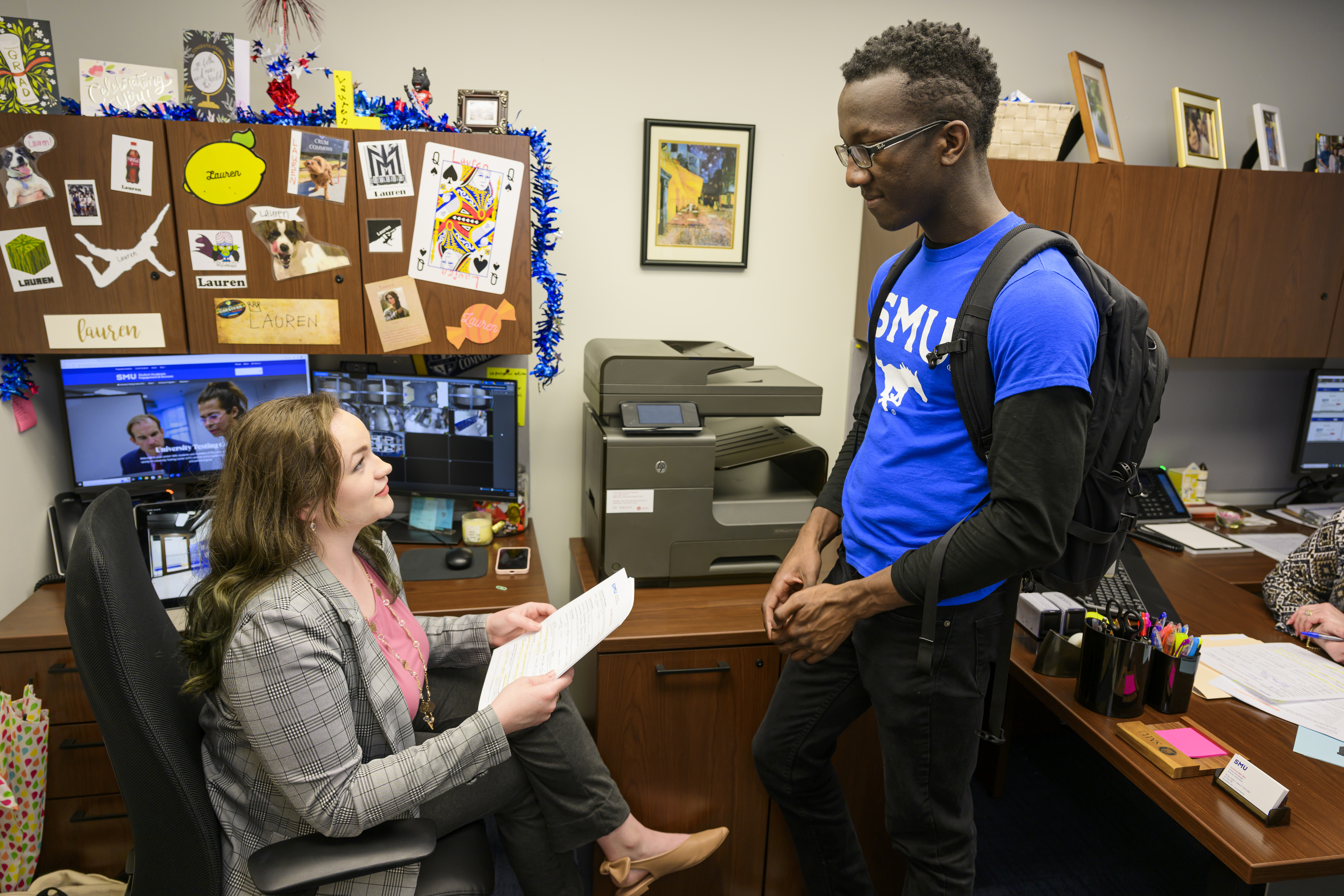 Professor helping a student